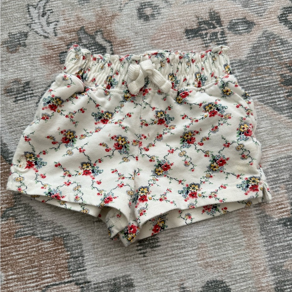 Size 6 months. Ralph Lauren Ivory Floral Print Shorts